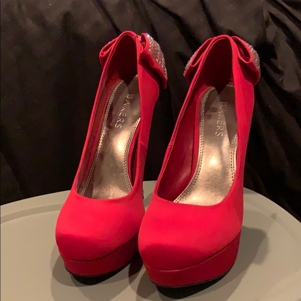 Red heels, jeweled bows on back